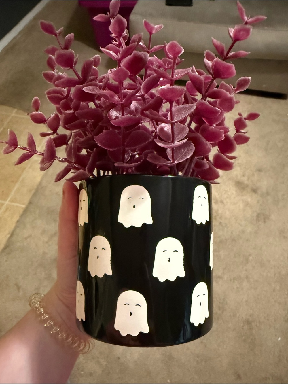 Black Ghost Pattern Ceramic Planter with Pink Faux Foliage